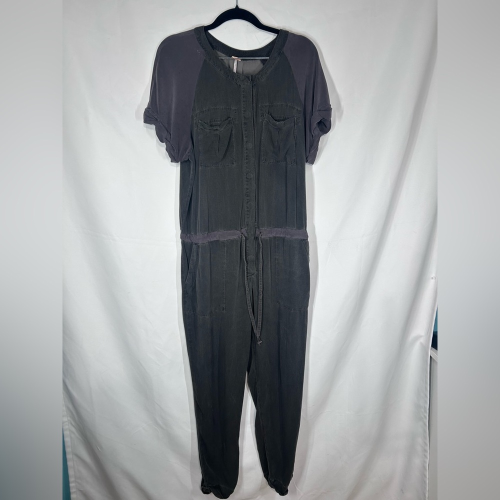 Free People size small Utility jumpsuit.  Washed black.  Tie waist, snaps